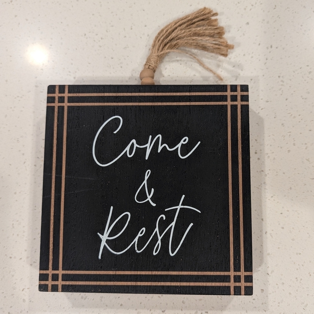 Black and Brown Wall Decor with Tassel
